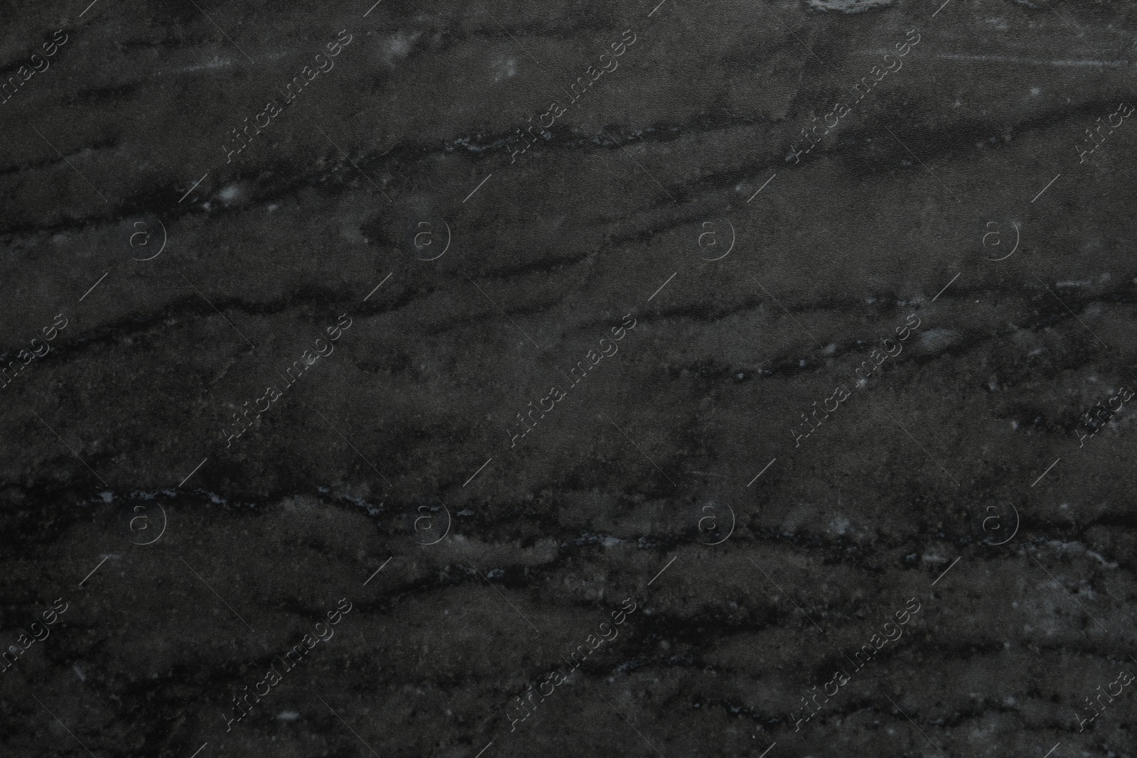 Photo of Black marble surface as background, closeup view