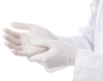 Doctor wearing medical gloves on white background, closeup