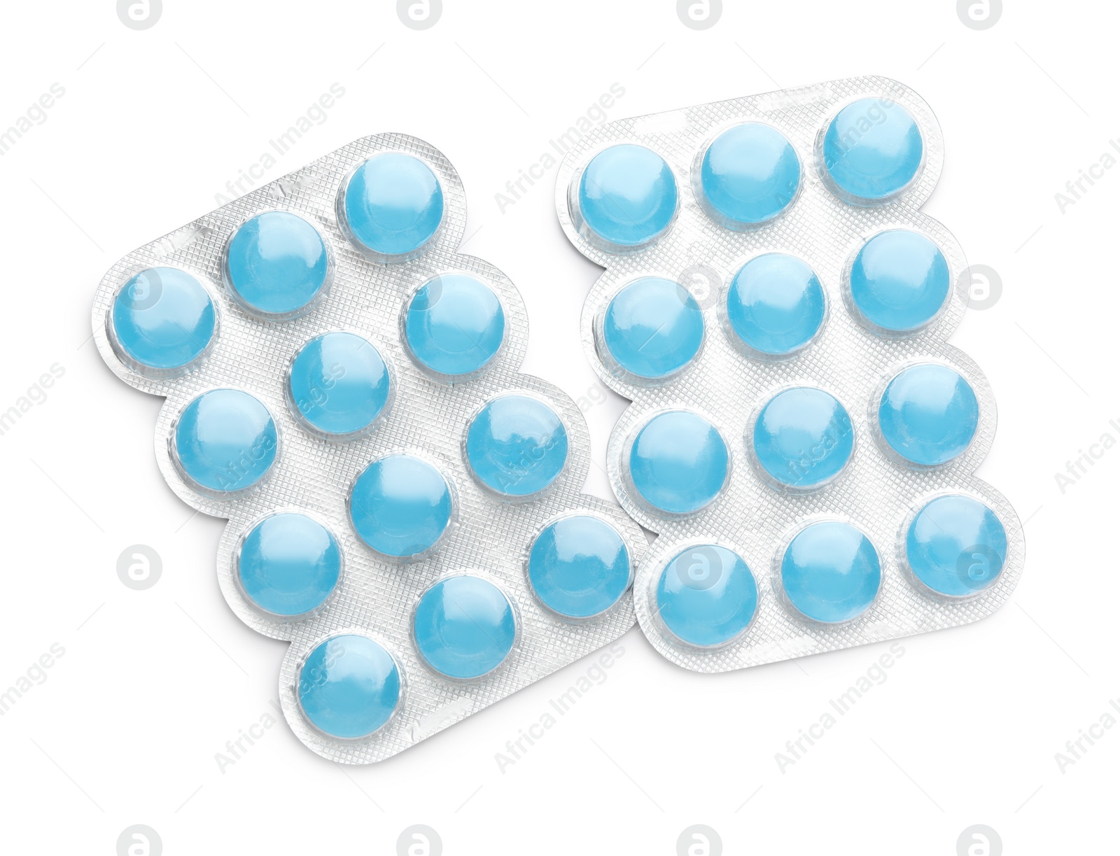 Photo of Blisters with blue cough drops on white background, top view