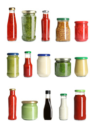 Set with delicious sauces in glassware on white background