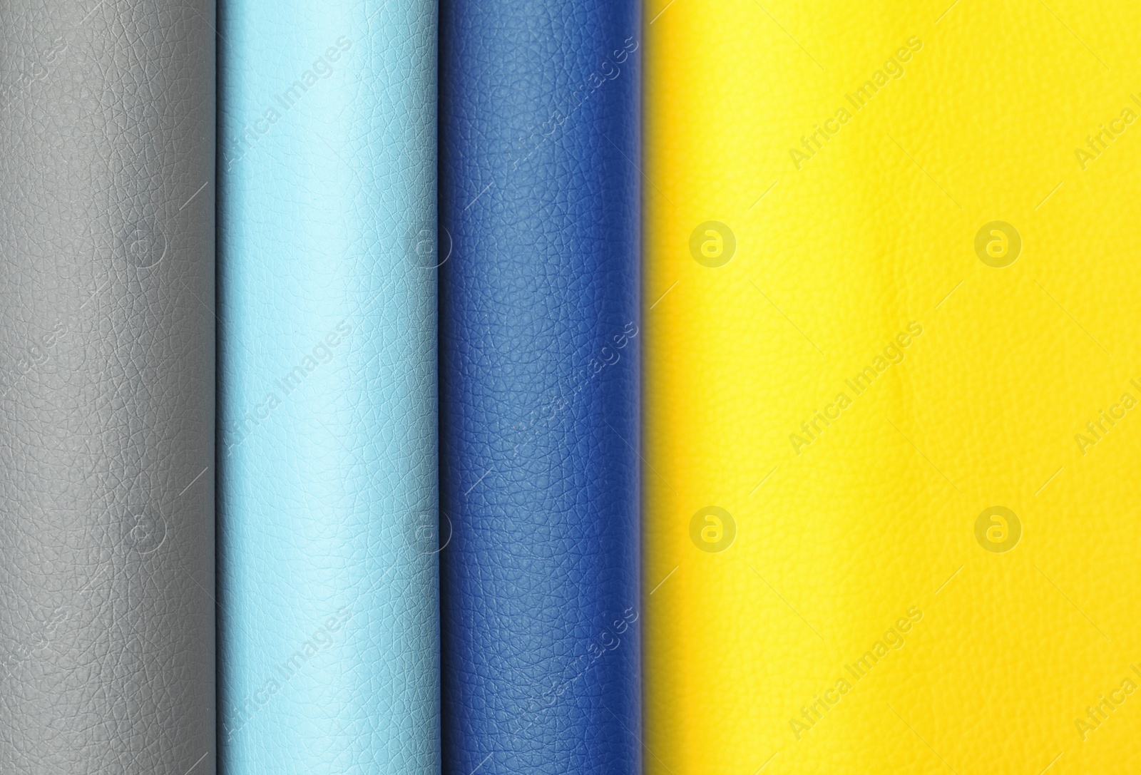 Photo of Leather samples of different colors for interior design as background