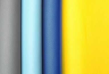 Photo of Leather samples of different colors for interior design as background