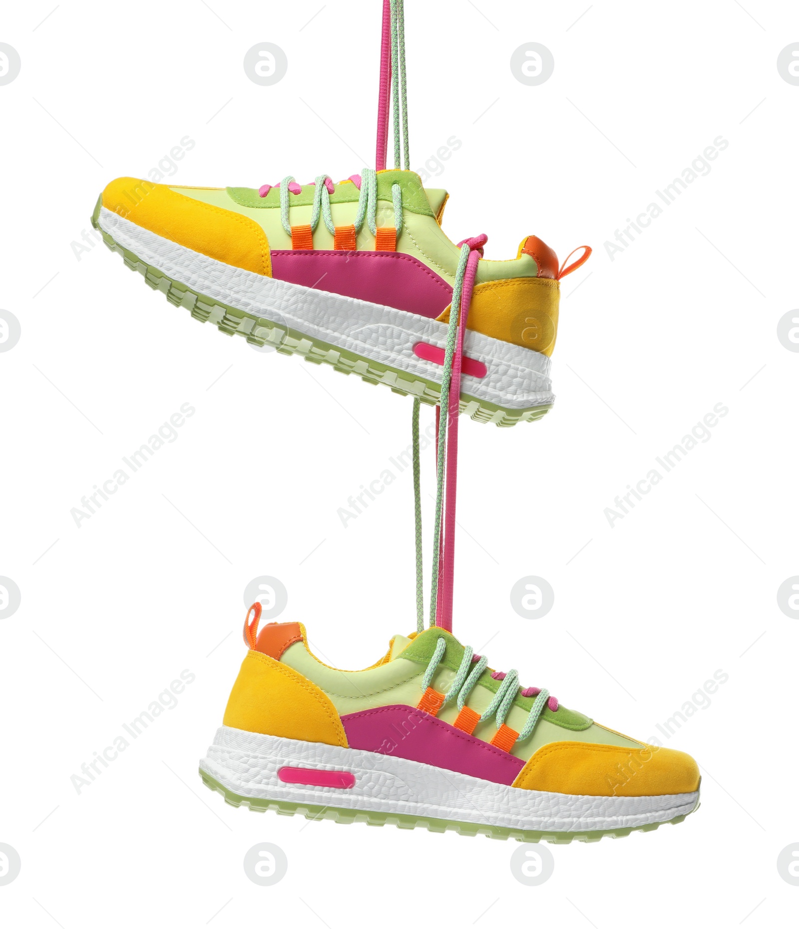 Photo of Pair of stylish colorful sneakers isolated on white