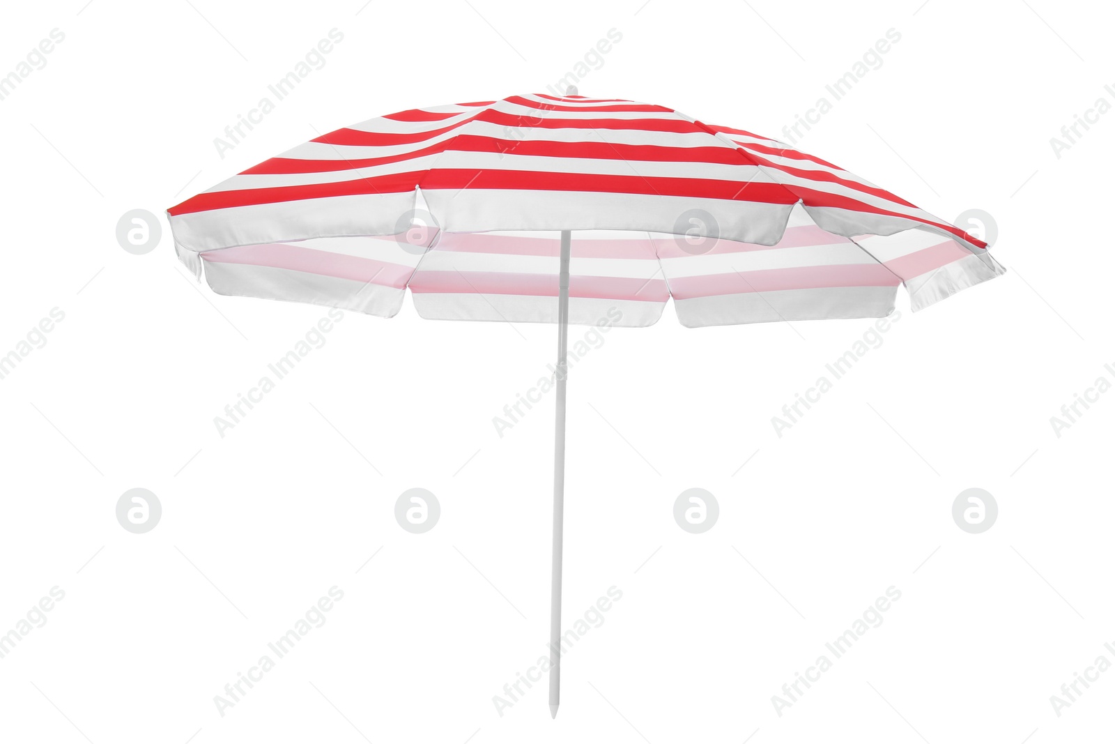 Photo of Open red striped beach umbrella isolated on white