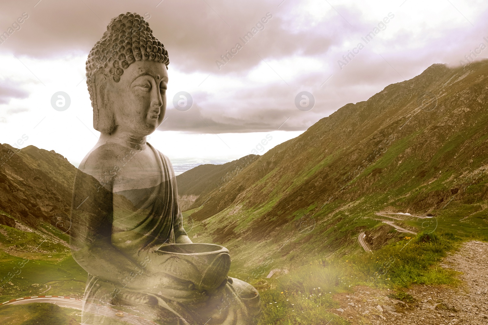 Image of Majestic Buddha sculpture on beautiful mountain slope
