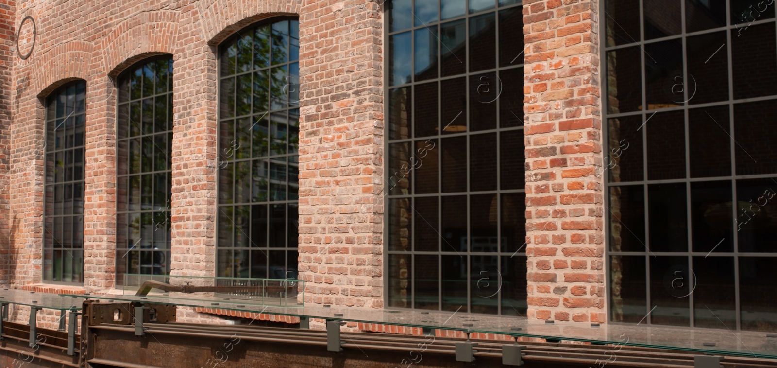 Photo of Beautiful building with large windows on sunny day