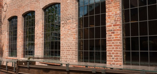 Photo of Beautiful building with large windows on sunny day