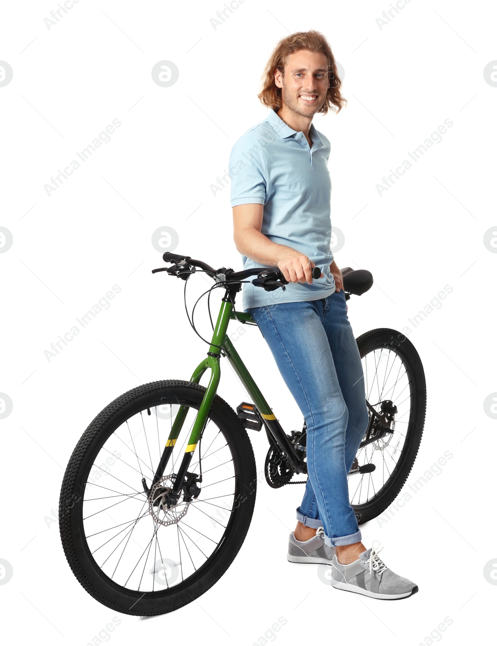 Photo of Happy young man with bicycle on white background