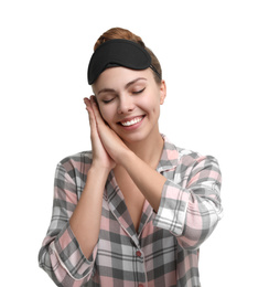 Photo of Beautiful woman wearing pajamas and sleeping mask on white background. Bedtime