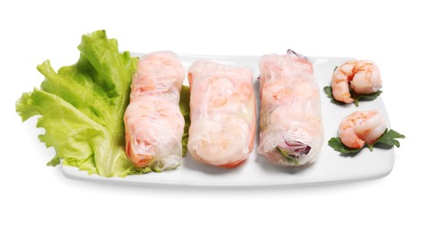 Delicious spring rolls with shrimps wrapped in rice paper on white background