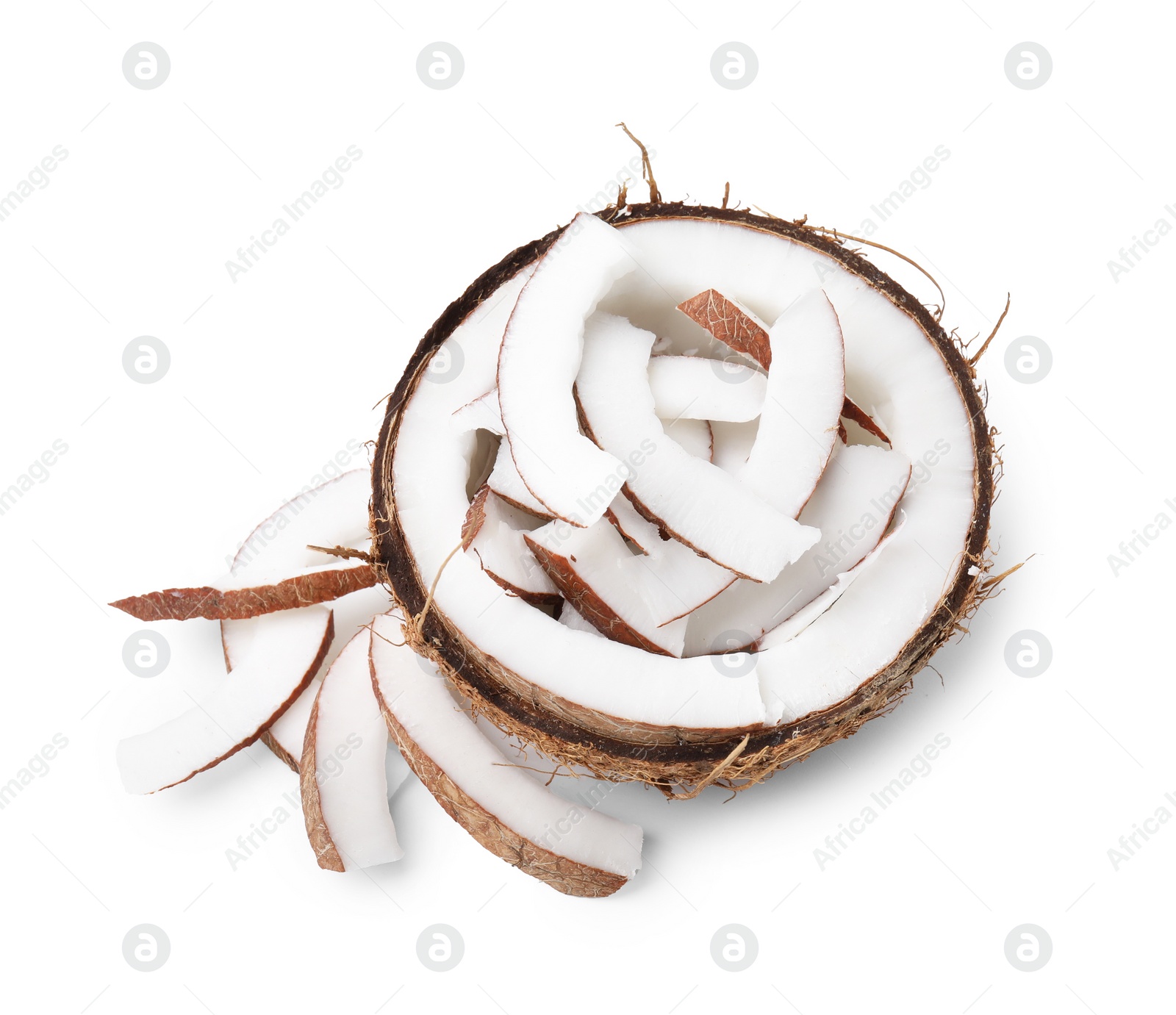 Photo of Coconut pieces in nut shell isolated on white