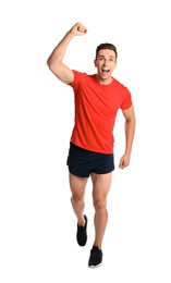 Photo of Sporty young man running on white background