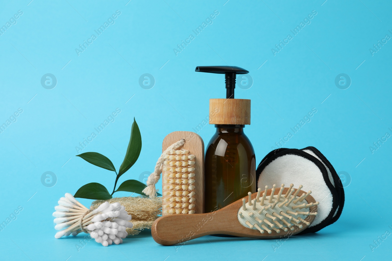 Photo of Composition with eco friendly products on light blue background. Conscious consumption