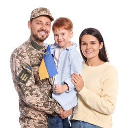 Photo of Ukrainian defender in military uniform and his family with flag on white background