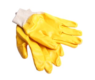 Yellow gardening gloves on white background, top view