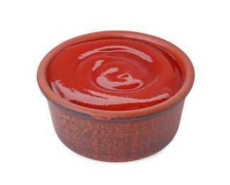 Photo of Bowl of tasty ketchup isolated on white. Tomato sauce