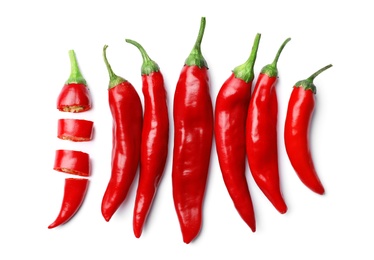 Photo of Fresh red chili peppers on white background, top view