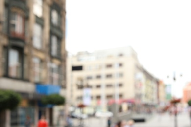 Blurred view of city street on sunny day