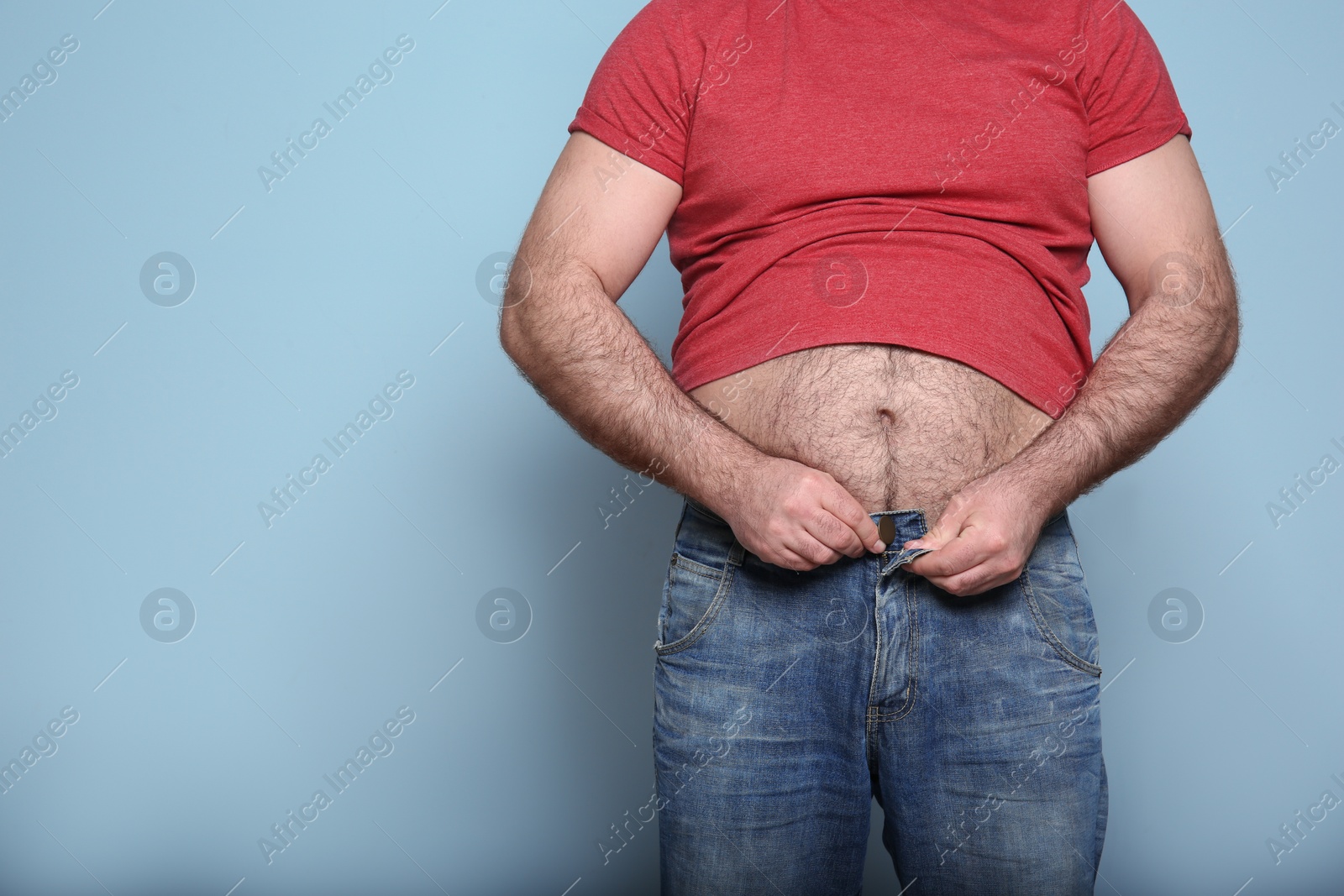 Photo of Overweight man on color background