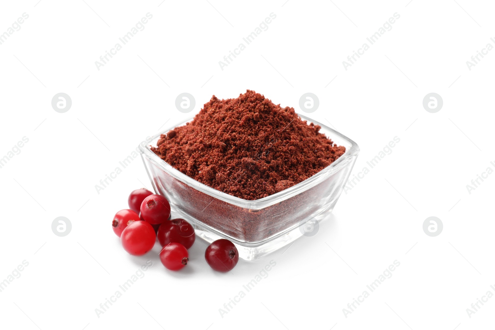 Photo of Cranberry powder in bowl and fresh berries isolated on white