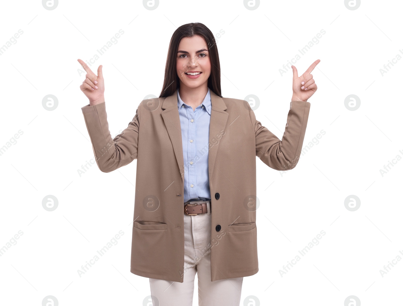 Photo of Beautiful happy businesswoman pointing at something on white background