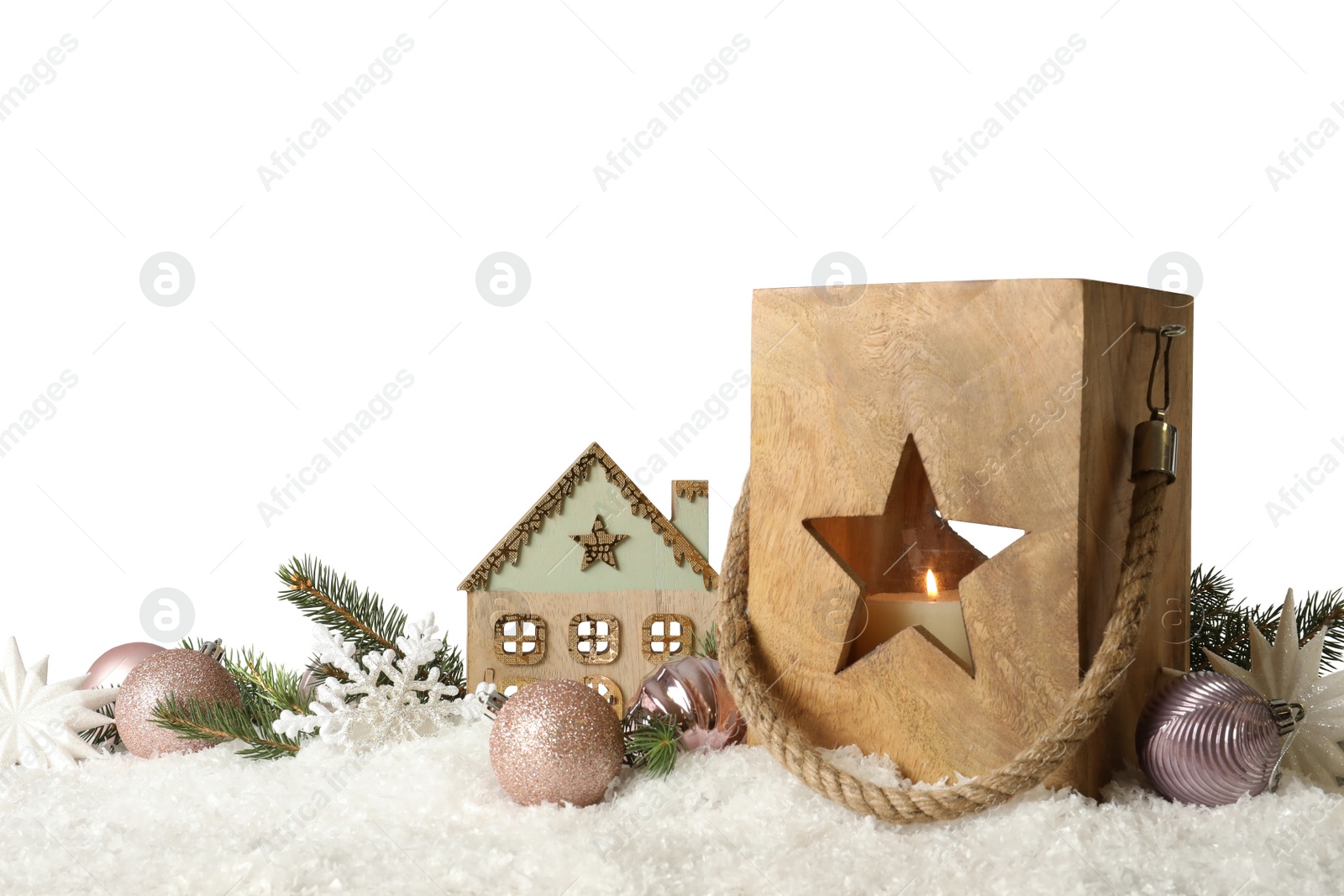 Photo of Composition with wooden Christmas lantern on snow against light grey background, space for text