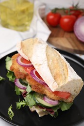 Photo of Delicious sandwich with schnitzel on table, closeup