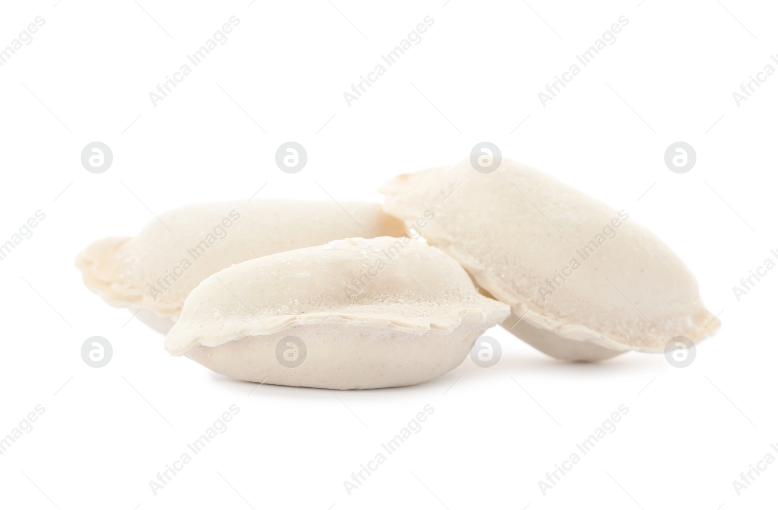 Photo of Raw dumplings with tasty filling on white background