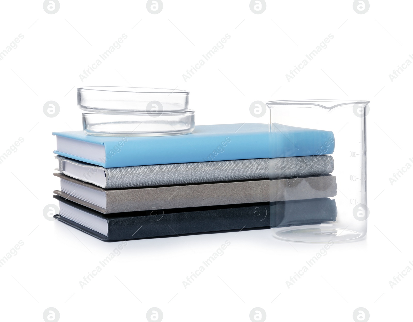 Photo of Books and medical students stuff isolated on white.