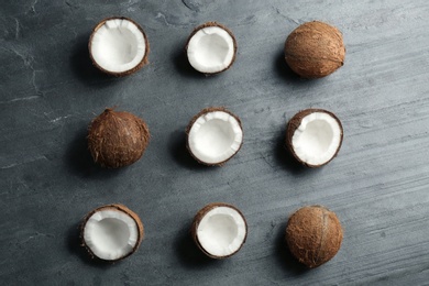 Photo of Coconut pattern on grey table, flat lay