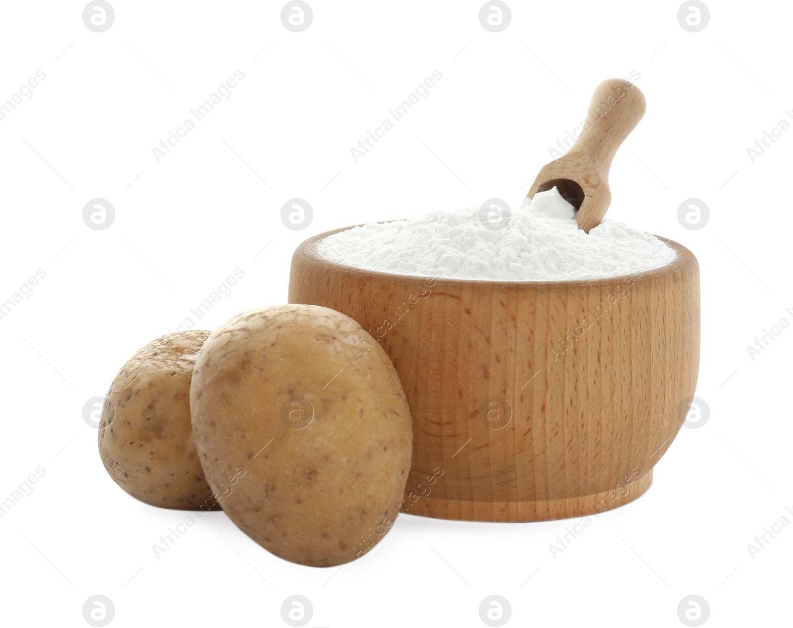 Photo of Wooden bowl with starch, scoop and fresh potatoes on white background