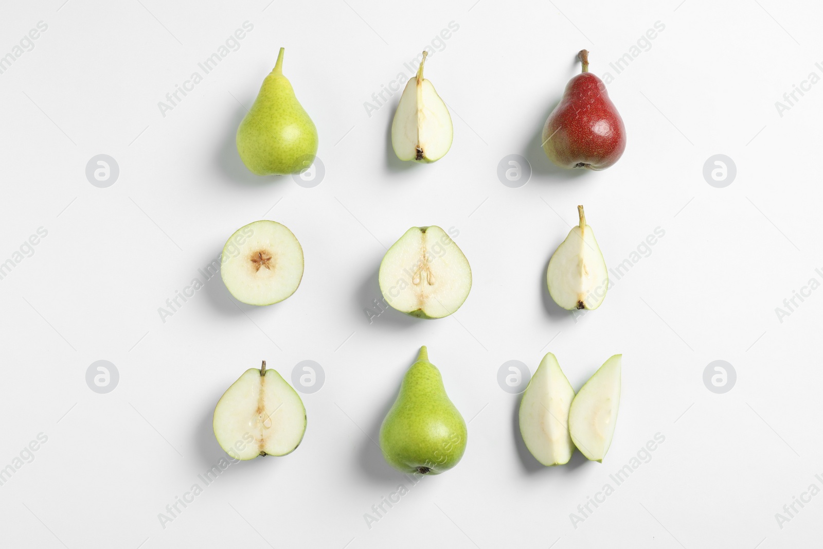 Photo of Ripe juicy pears on white background, top view