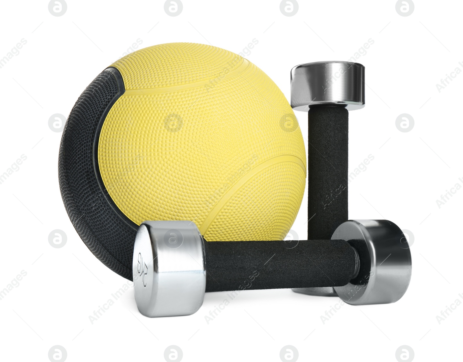 Photo of Medicine ball and dumbbells on white background