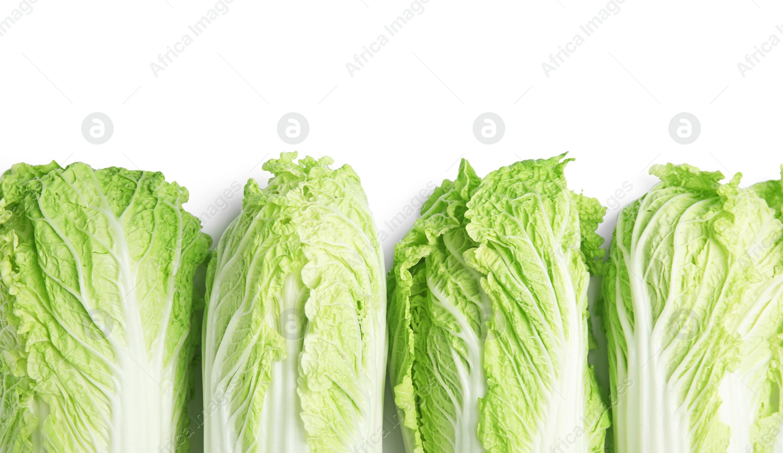 Photo of Fresh ripe cabbages on white background