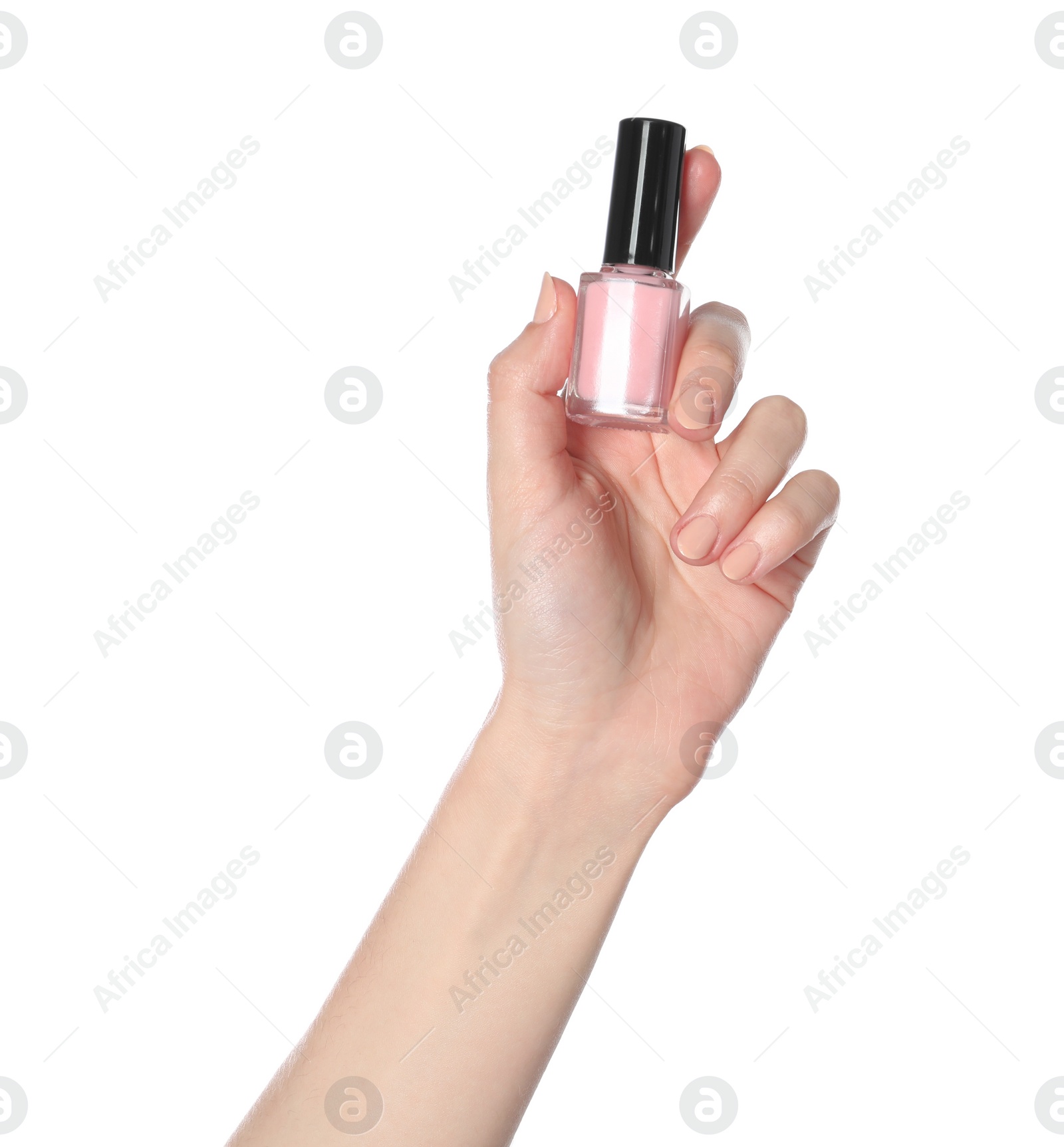 Photo of Woman holding nail polish on white background, closeup