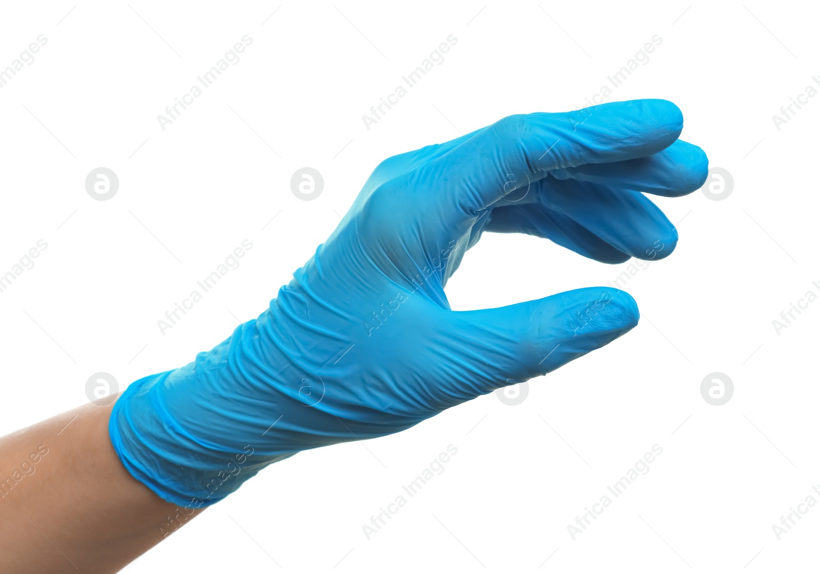 Photo of Doctor wearing light blue medical glove holding something on white background, closeup