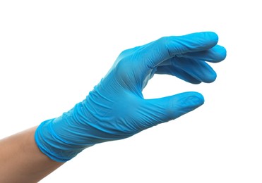 Doctor wearing light blue medical glove holding something on white background, closeup