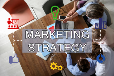 Image of Digital marketing strategy. Team of professionals working together at table in office, top view