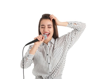 Young woman wearing casual clothes singing in microphone on white background