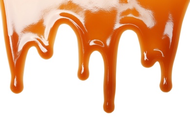 Photo of Delicious caramel sauce on white background