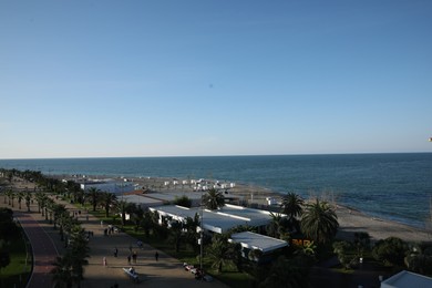 Batumi, Georgia - October 12, 2022: Picturesque view of modern city near sea coast