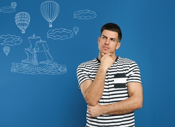 Image of Man dreaming about vacation on blue background