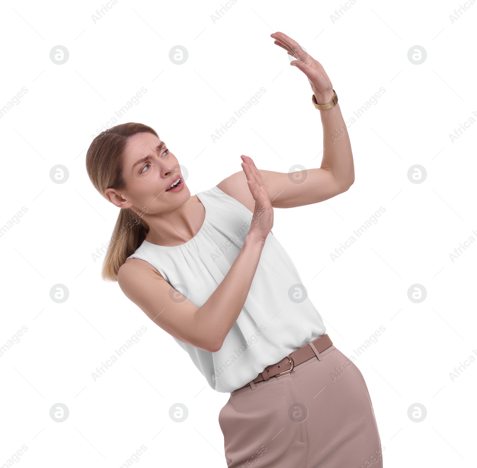 Photo of Beautiful businesswoman avoiding something on white background