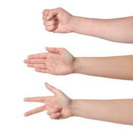 People playing rock, paper and scissors on white background, closeup