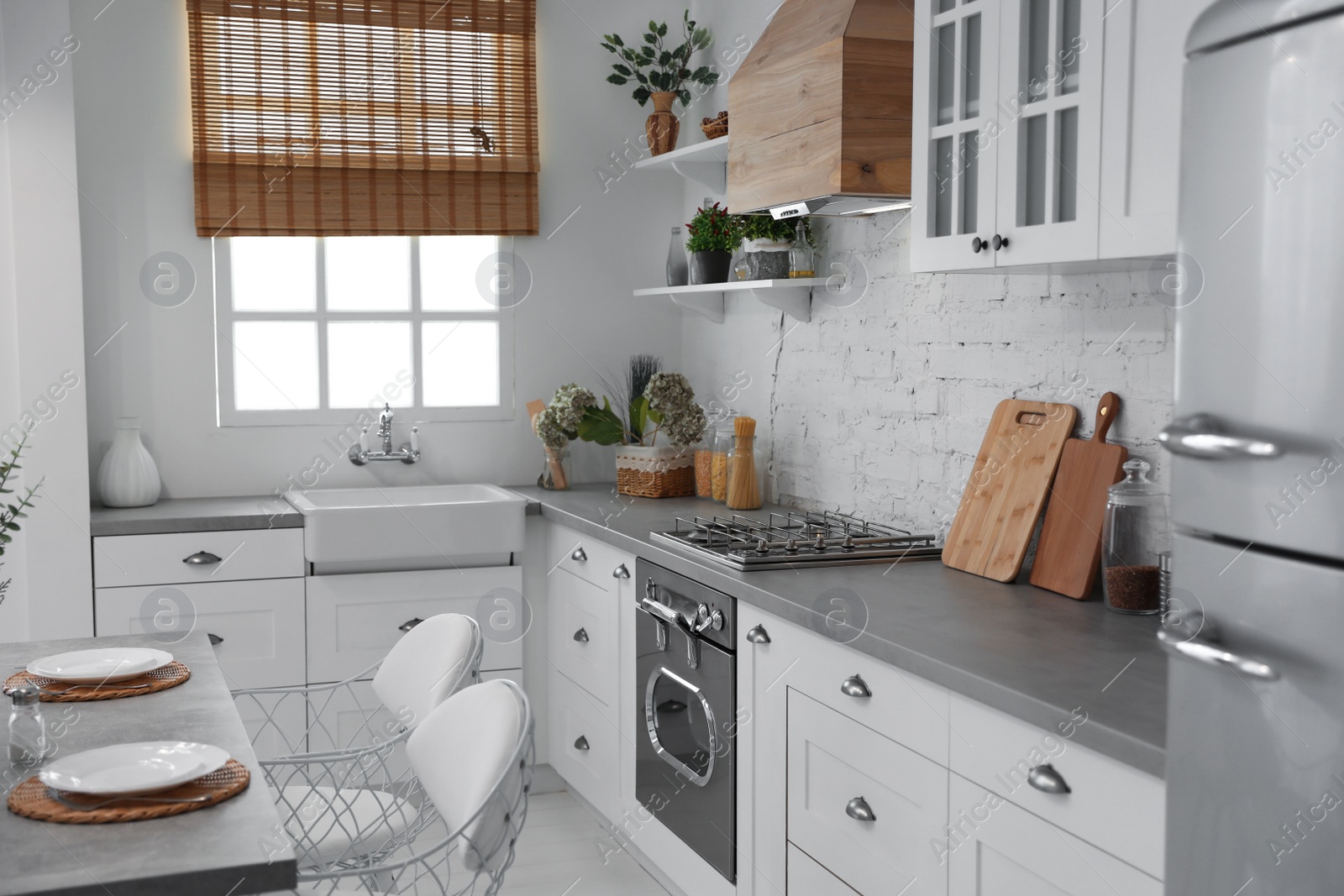 Photo of Beautiful kitchen interior with new stylish furniture