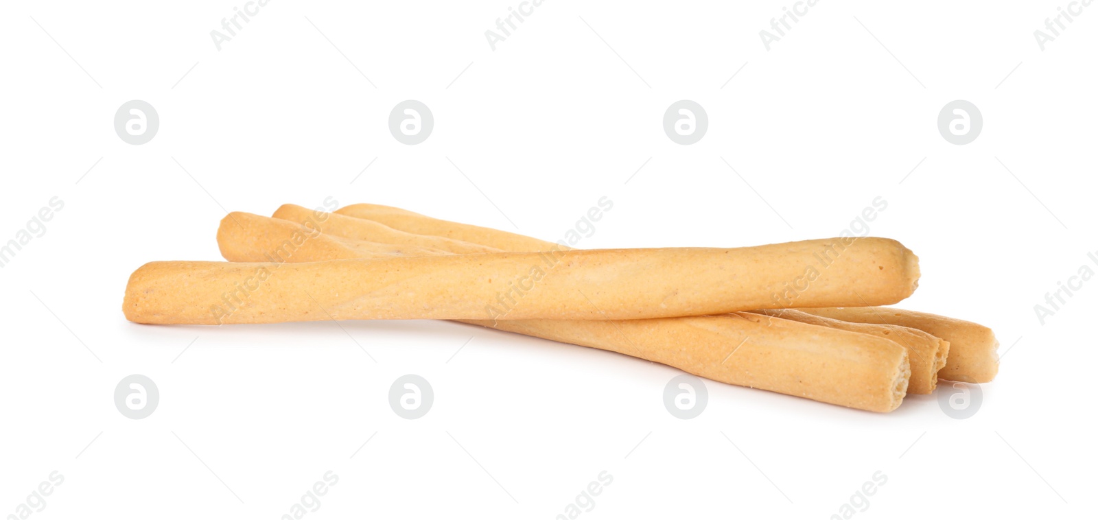 Photo of Fresh delicious grissini sticks on white background