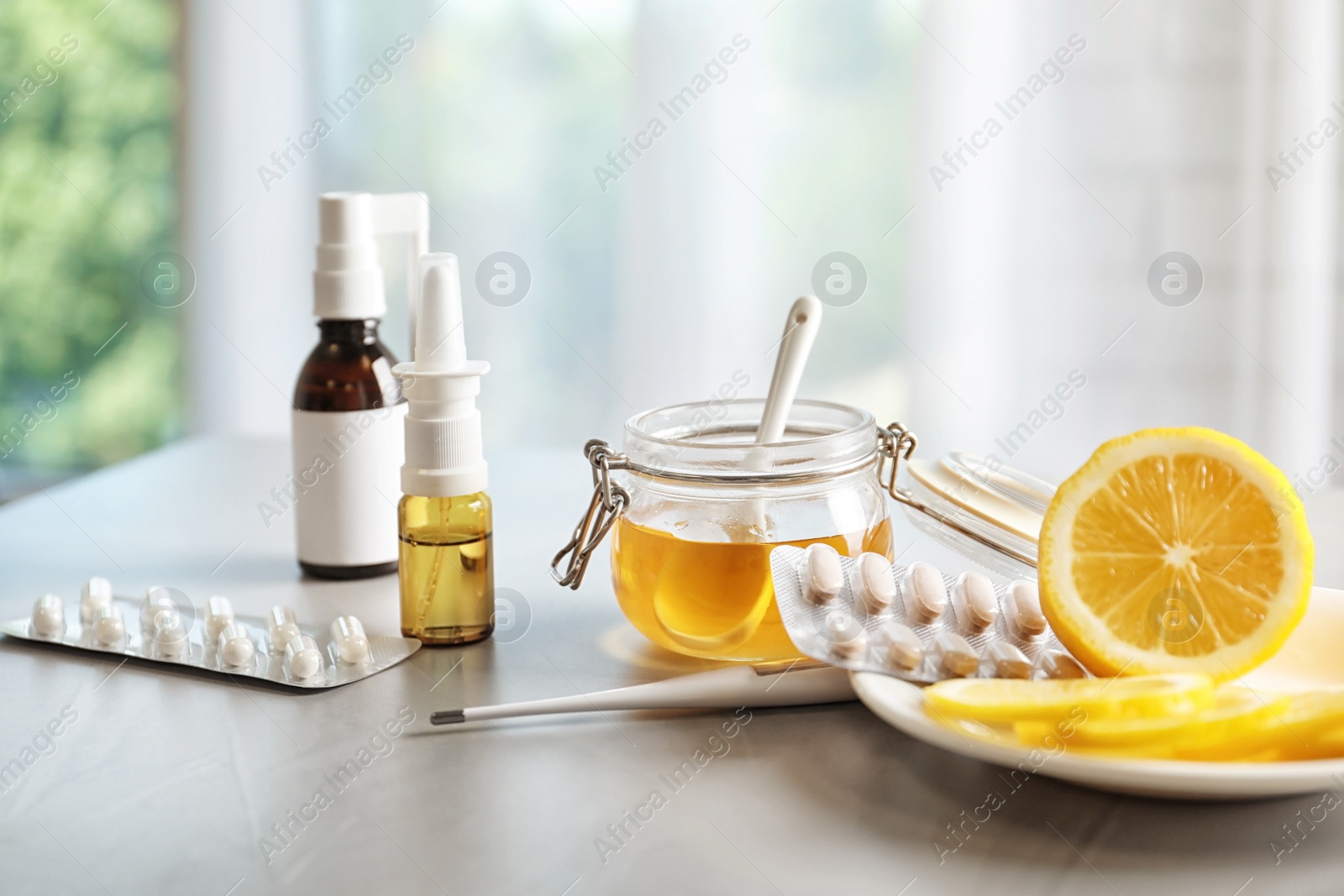 Photo of Natural and medical cold remedies on table