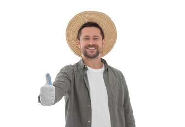 Photo of Harvesting season. Happy farmer showing thumb up on white background