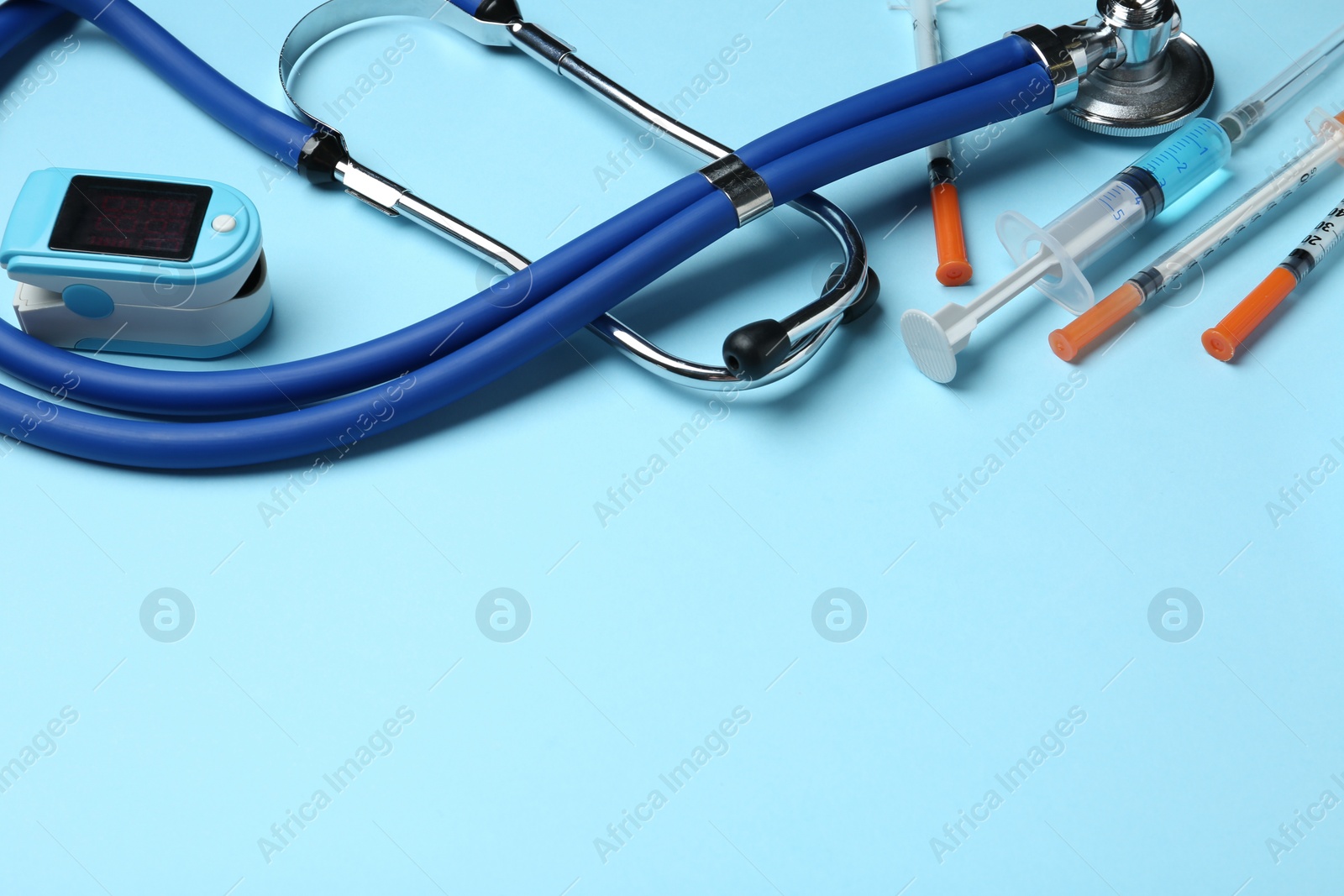 Photo of Different medical objects on color background. Space for text