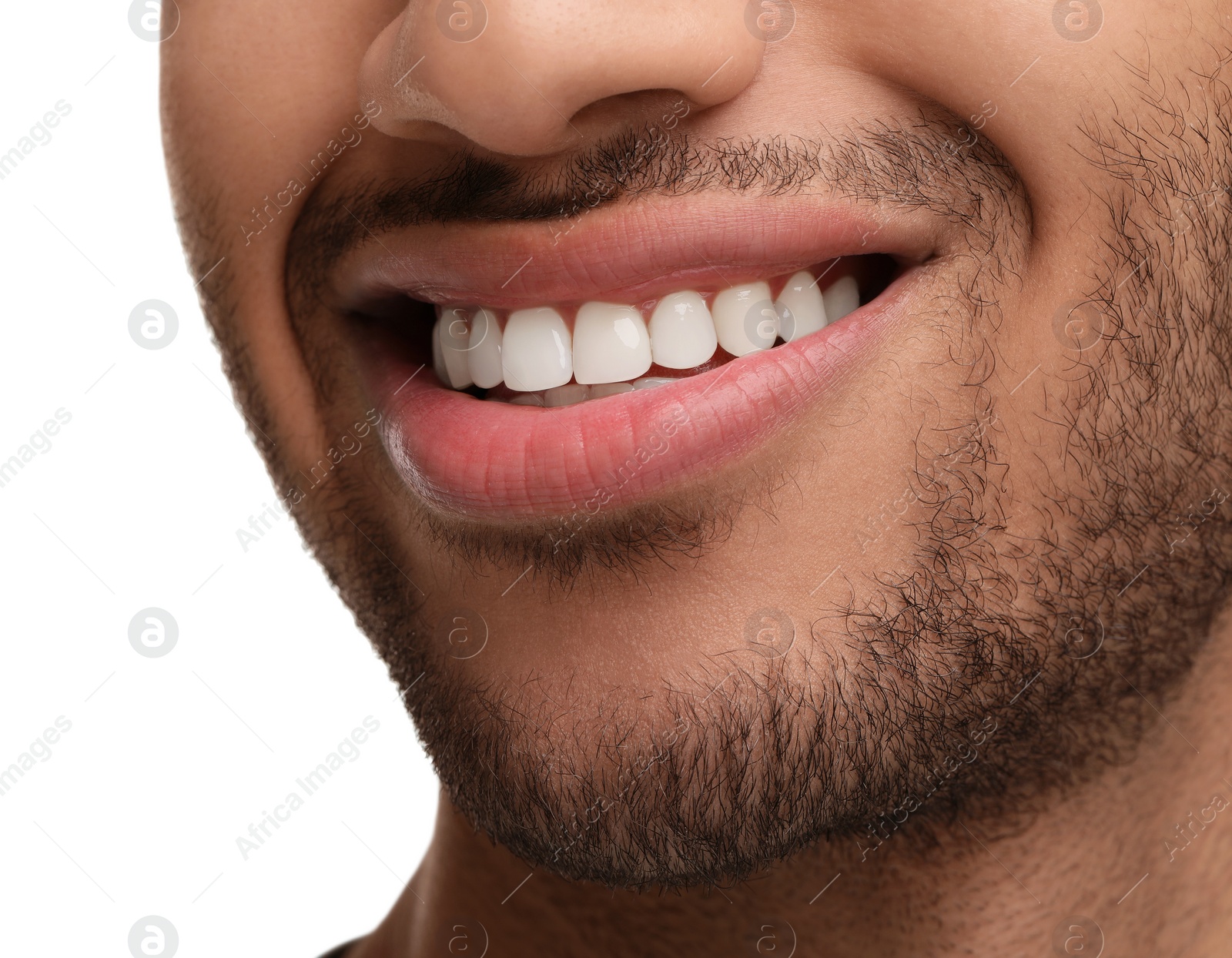 Photo of Smiling man with healthy clean teeth on white background, closeup